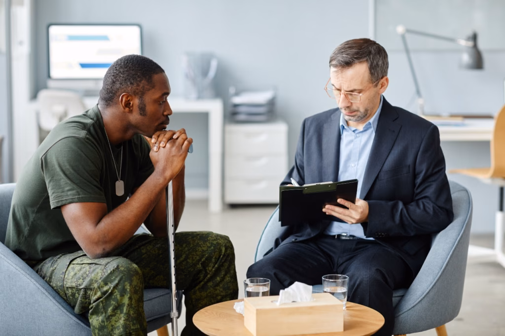 Therapist and patient engaged in conversation.
